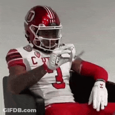Football Player Number 10 Being Tackled GIF