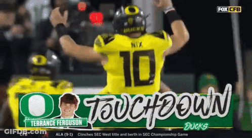 Football Player Number 10 Celebrating Touchdown GIF