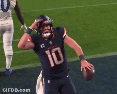 Football Player Number 10 Holding Football GIF