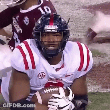 Football Player Number 10 Holding Football GIF