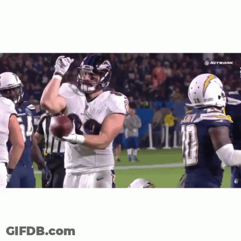 Football Player Number 10 Holding Football GIF
