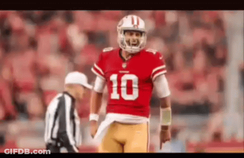 Football Player Number 10 Next To Referee GIF