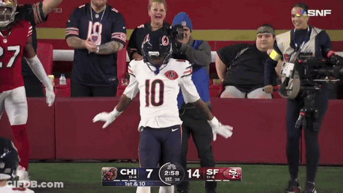 Football Player Number 10 On Field GIF