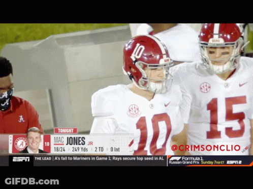 Football Player Number 10 Putting On Helmet GIF