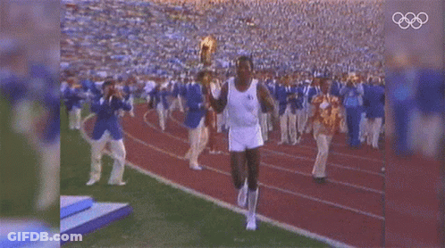 Football Player Number 10 Running On Field GIF