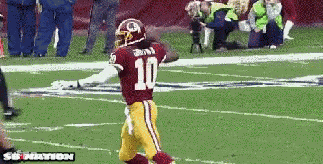 Football Player Number 10 Running On Field GIF
