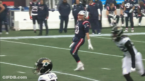 Football Player Number 10 Running On Field GIF