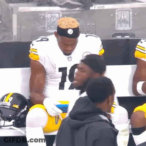 Football Player Number 10 Sitting On Bench GIF