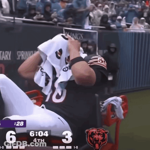 Football Player Number 10 Sitting On Bench GIF