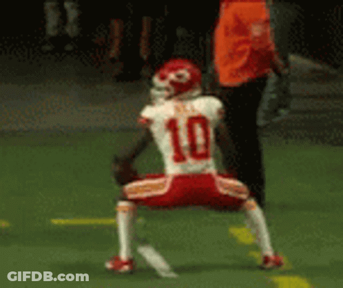 Football Player Number 10 Squatting GIF