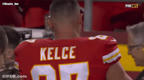 Football Player Number 10 Squatting On Field GIF