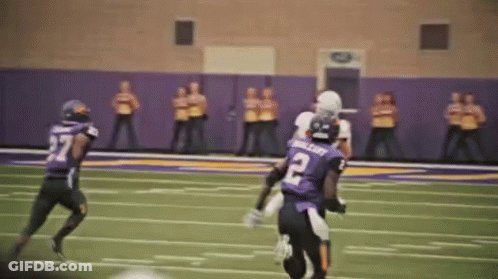 Football Player Number 10 Standing On Field GIF