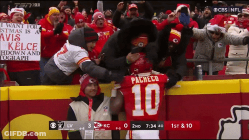 Football Player Number 10 Surrounded By Fans GIF