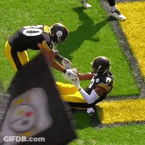 Football Player Number 10 Talking To Another Player GIF