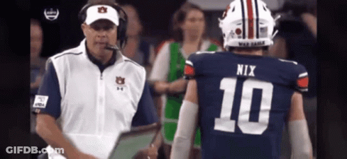 Football Player Number 10 Talking To Coach GIF