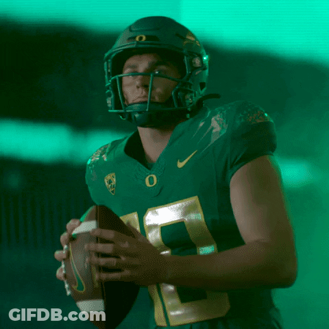 Football Player Number 10 Throwing Ball GIF