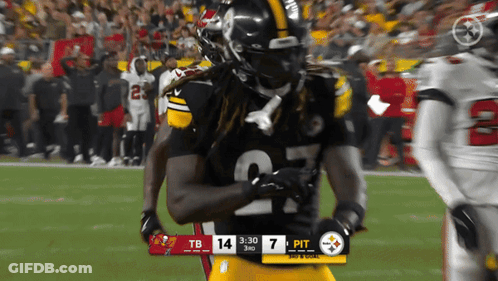 Football Player Number 11 Arms Outstretched GIF