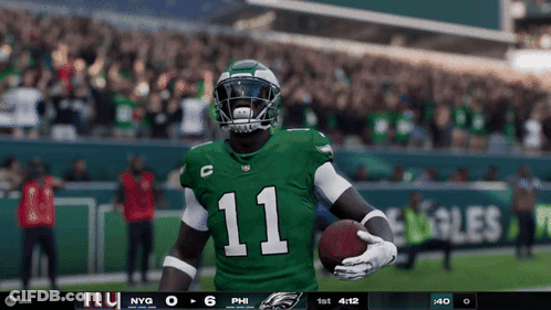 Football Player Number 11 Holding Ball GIF