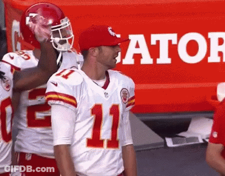 Football Player Number 11 In Front Of Gatorade Sign GIF