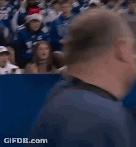 Football Player Number 11 Jersey Next To Woman GIF