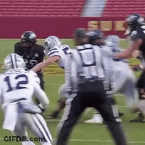 Football Player Number 12 Being Tackled GIF
