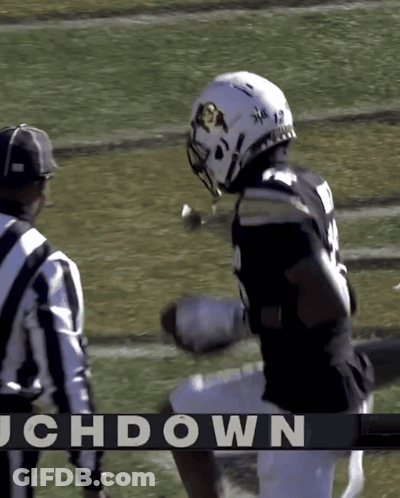 Football Player Number 12 Next To Referee GIF