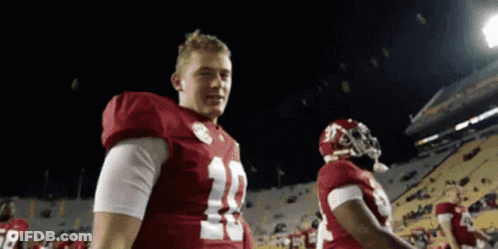 Football Player Number 12 On Field GIF