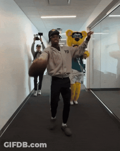 Football Player Number 12 On Field GIF