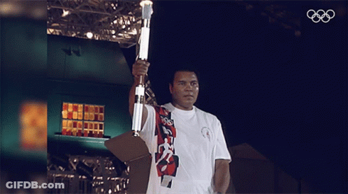 Football Player Number 12 On Field GIF