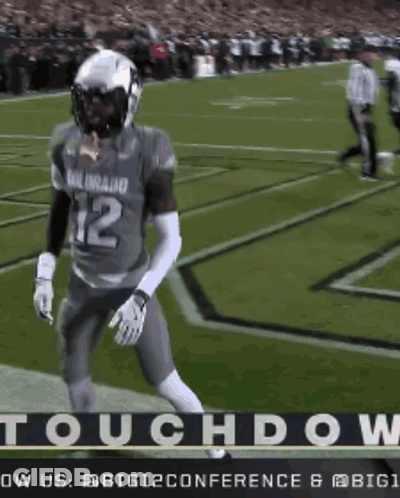 Football Player Number 12 Running On Field GIF