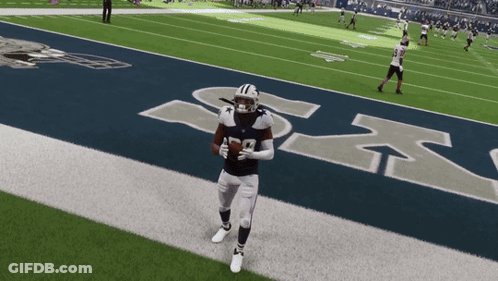 Football Player Number 12 Running On Field GIF