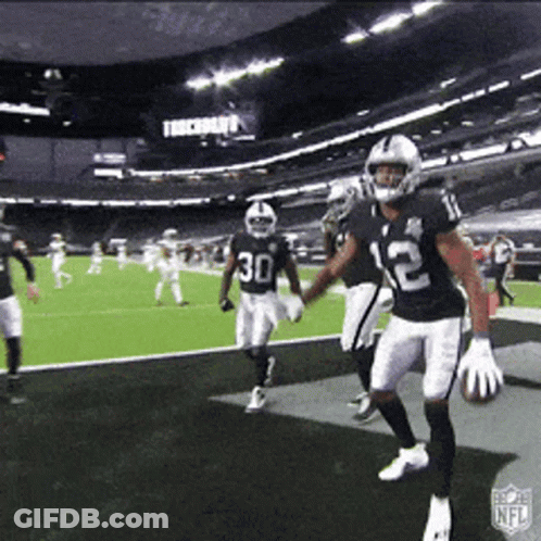 Football Player Number 12 Running On Field GIF