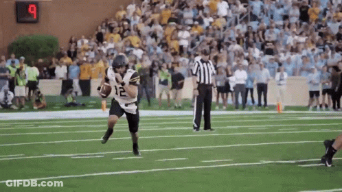 Football Player Number 12 Running With Ball GIF