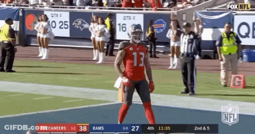 Football Player Number 13 On Field GIF