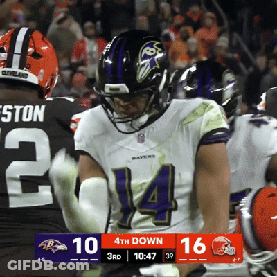 Football Player Number 14 In Front Of Scoreboard GIF