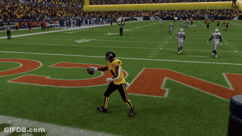 Football Player Number 14 Kicking Ball GIF