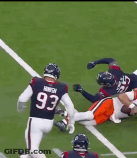 Football Player Number 15 Being Tackled GIF