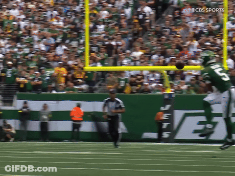 Football Player Number 15 Catching Ball GIF
