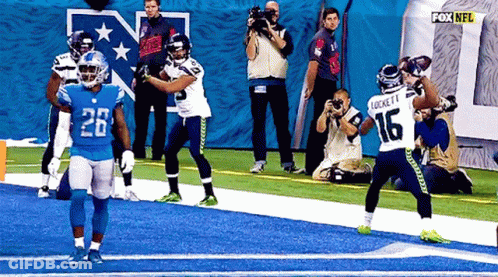 Football Player Number 16 Running GIF