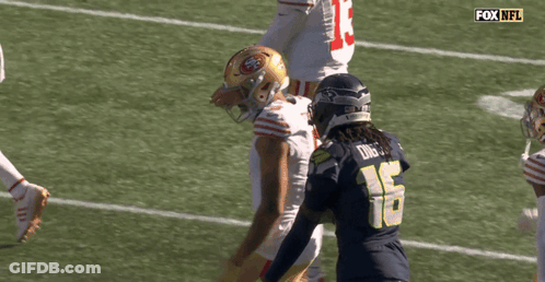 Football Player Number 16 Talking To Another GIF