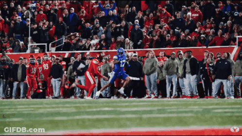 Football Player Number 17 Being Tackled GIF