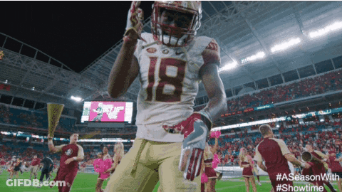 Football Player Number 18 Celebrating On Field GIF