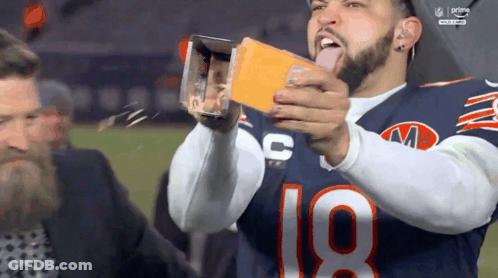 Football Player Number 18 Holding Cheese Box GIF