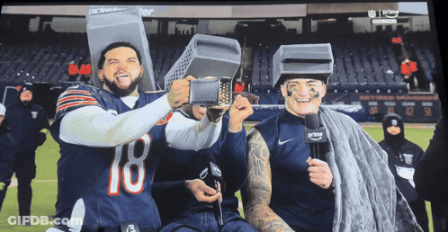 Football Player Number 18 Holding Microphone GIF