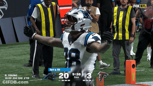 Football Player Number 18 On Field GIF