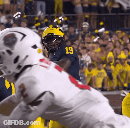 Football Player Number 19 Being Tackled GIF