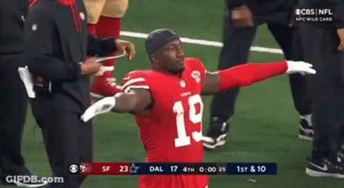 Football Player Number 19 With Arms Outstretched GIF