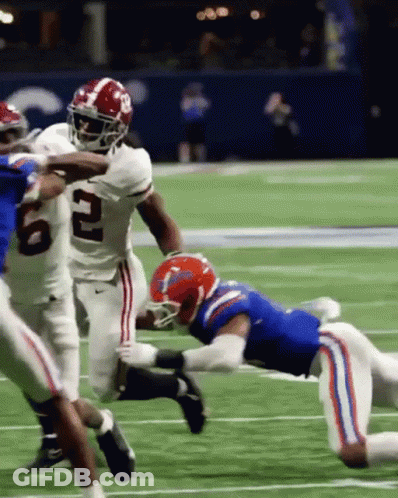 Football Player Number 2 Being Tackled GIF