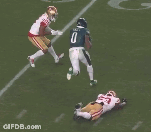 Football Player Number 2 Being Tackled GIF
