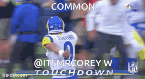 Football Player Number 2 Hugging Another Player GIF